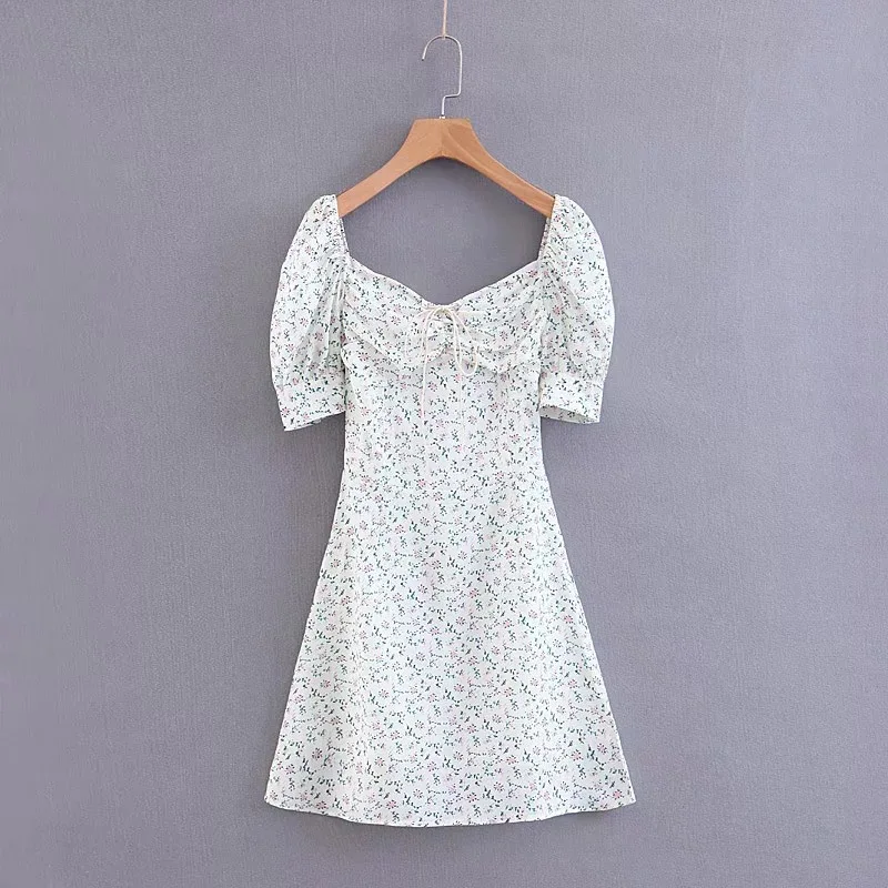 

A crisp white print dress with a bobbed waist ladies dress