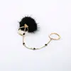 Pompon and Chain Multi Finger Ring