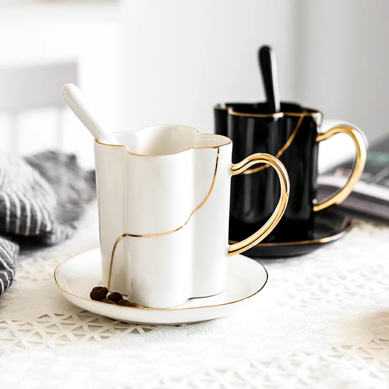 

Gold rimmed porcelain coffee cup saucer set, Black, white