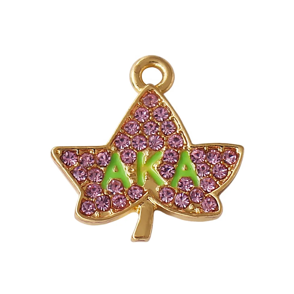 

Leaf shaped pink crystal and green enamel aka greek sorority aka gold or silver plated pendant