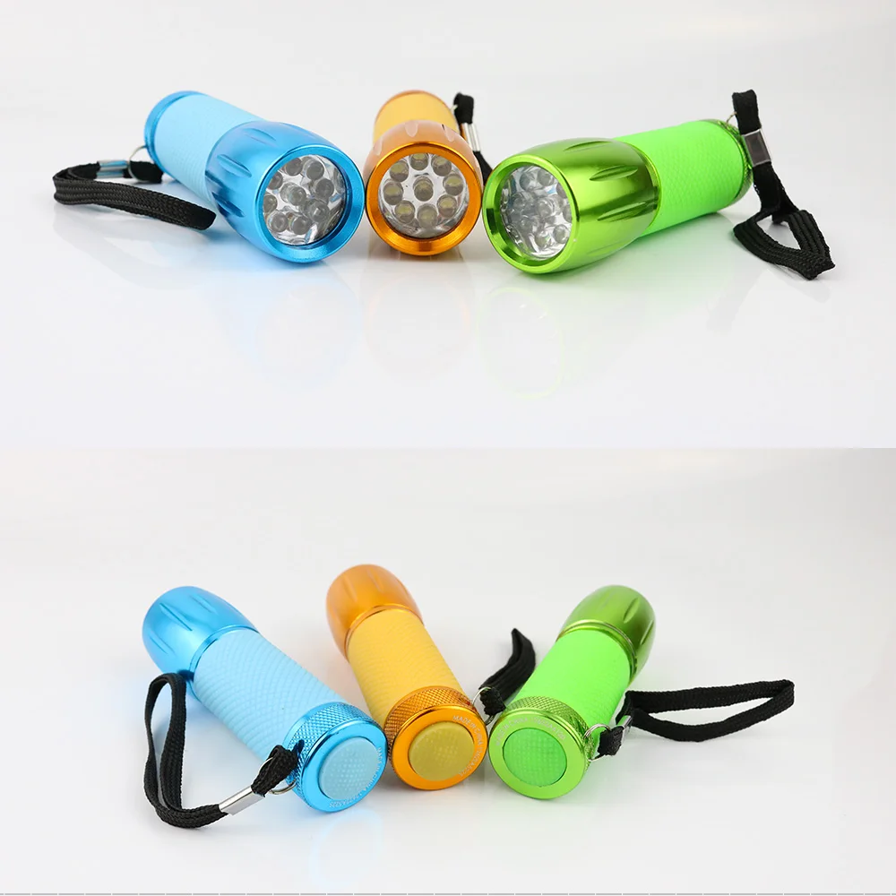 Wholesale Aluminum Cheap Portable Mini 9 LED Torch Light Flashlight with 3 AAA battery manufacture