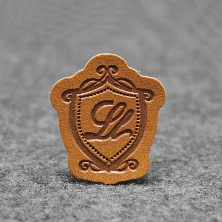

Custom Brand Embossed Leather Label For Jeans