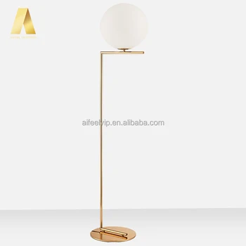 gold and glass floor lamp