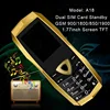 China mini unlock GSM A18 cheap dual sim cell phone 1.77 inch 1600mAh MP3 camera with luxury leather case wholesale or sample