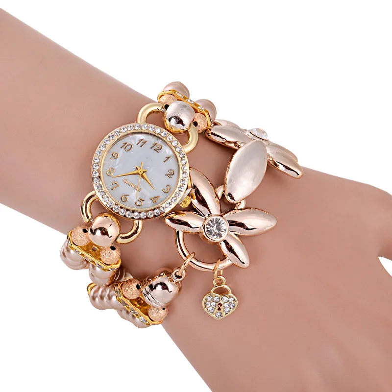 

Fashionable bracelet watch women leisure watch pearl flower winding watch