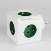 Universal cube socket for travel and desktop