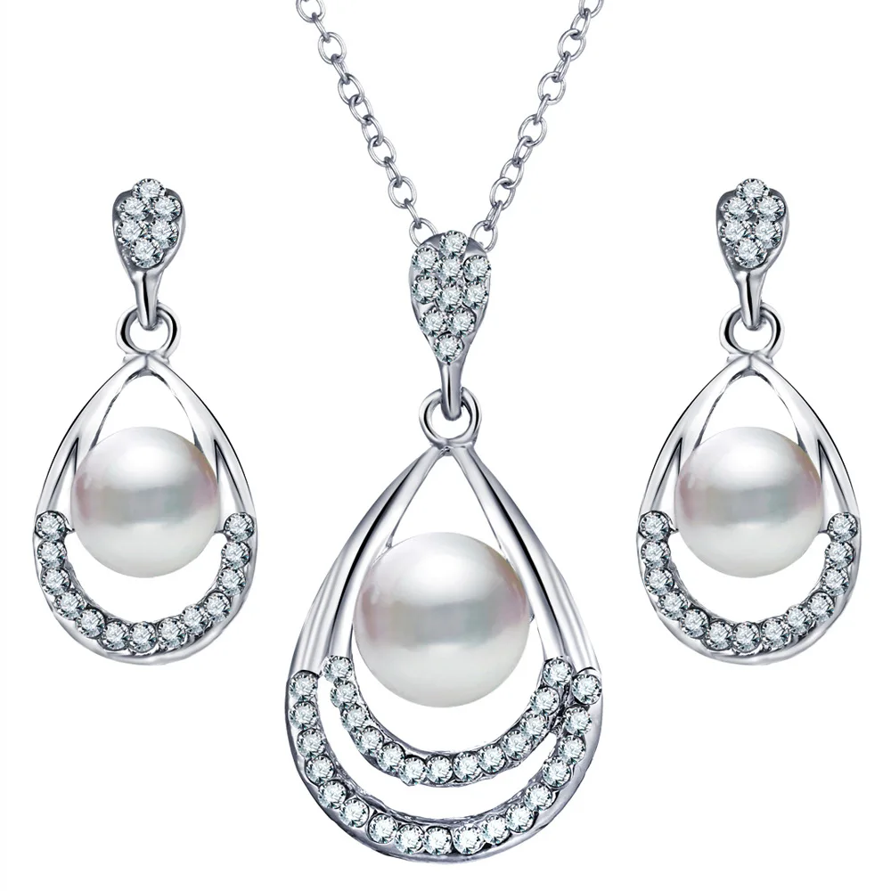 

Luxury Pearl Wedding Jewelry Sets For Bride Shiny Rhinestone Big Water Drop Crystal Pendant Necklace Earrings Set (KJ029), Same as the picture