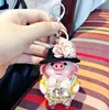 Korean version of cute cartoon set drill pig small fart car key chain creative female piglet doll bag decoration key chain