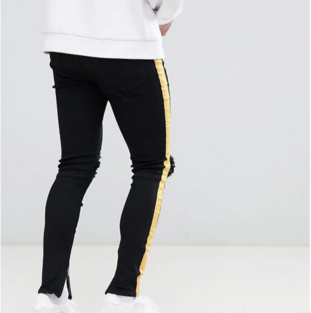 black pants with yellow side stripe