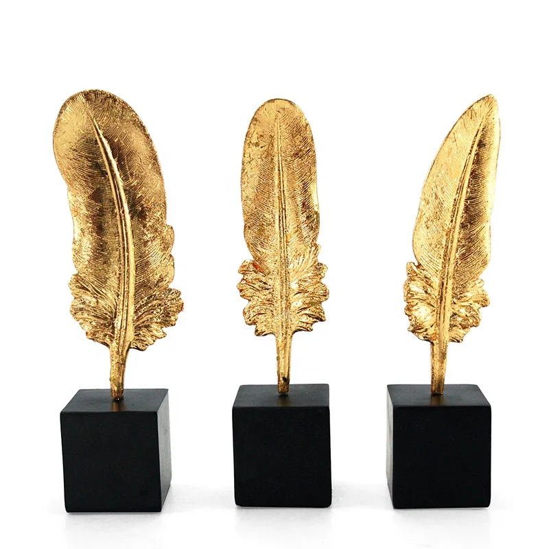 golden feather resin craft home decoration pieces with marble base supplier