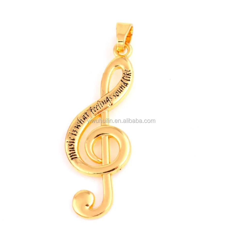 

IMG 7426 vintage jewelry Music Is What Feelings Sound Like musical note metal pendant