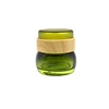 top selling products 50g luxury green glass jar cosmetic face cream jar water transfer lid set