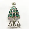 AKA green enamel Christmas Tree ladies rhinestone brooch