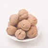 Organic wild small walnuts in shell