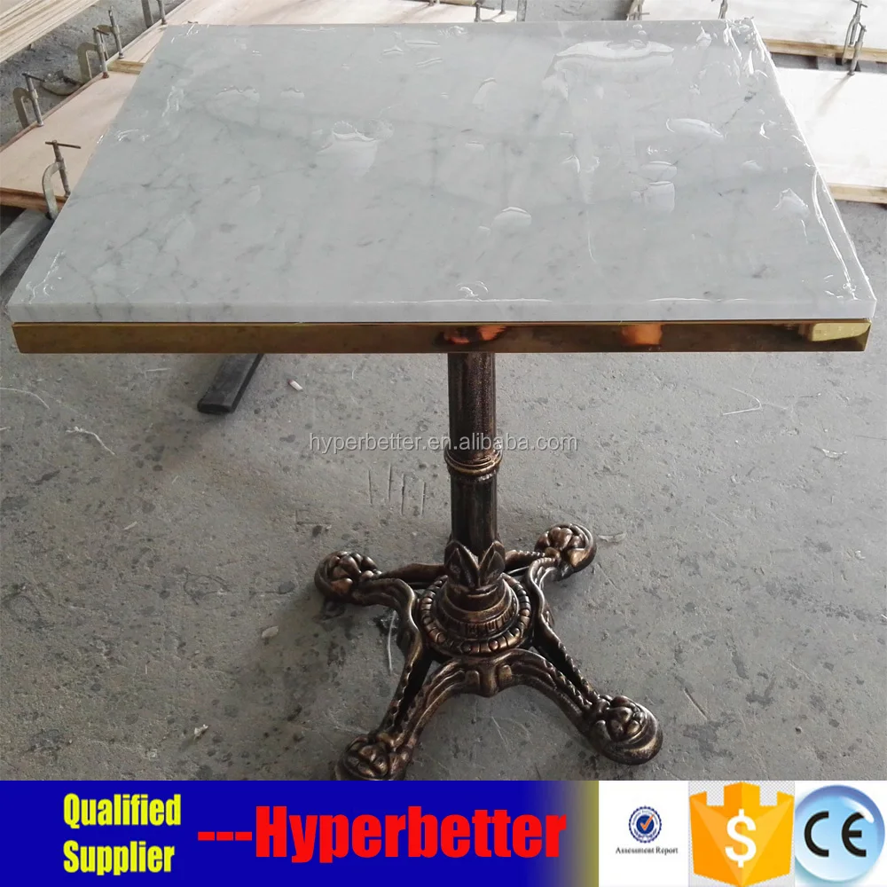 bianco carrara marble table with cast iron stand .jpg