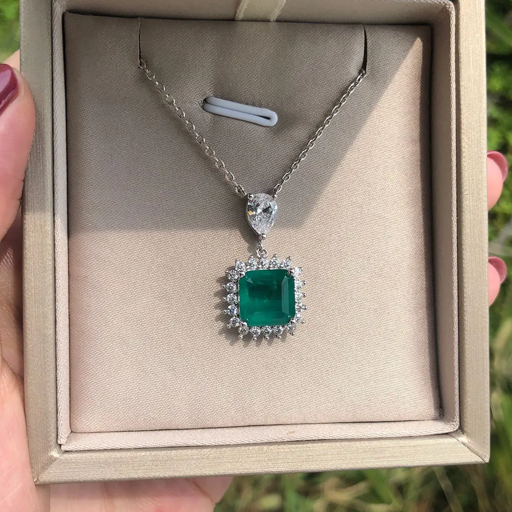 

Custom 18K yellow gold emerald pendant necklace mosaic diamond necklace