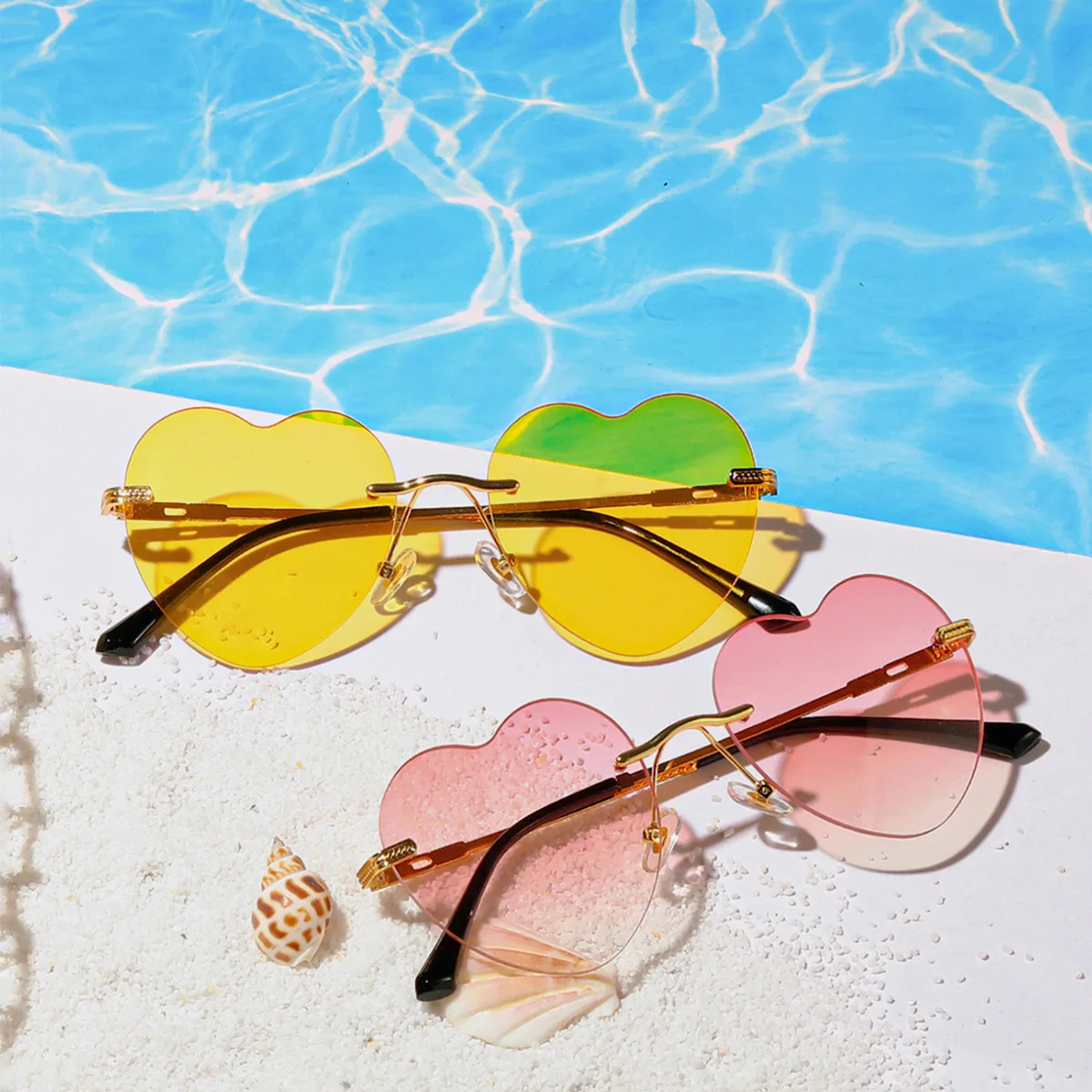 

2022 Hot Selling Cheap Wholesales Summer Sunshine Beach Style Romantic Colors Heart Shape Rimless Frame Fashion Sunglasses