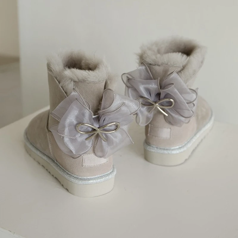 

Ladies Genuine Australia Sheepskin Leather Fur Lined Warm Outdoor Snow Sheepskin Winter Boots with bows for Women