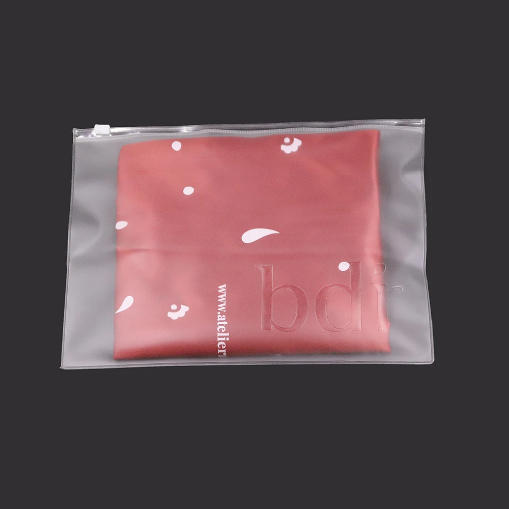 

Biodegradable Custom Debossed Logo Frosted PVC Zipper Bag For Clothes makeup Cosmetic Zip lock Packing Plastic Bags, Clear/frosted
