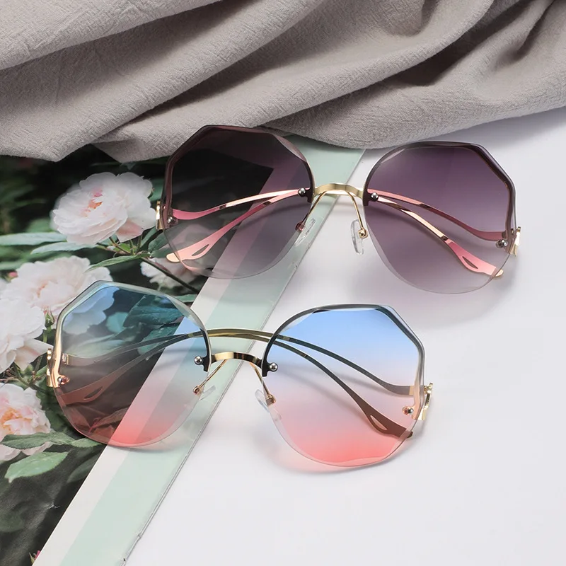 

DCOPTICAL Hot sale online fashion style women's rimless shaved sunglasses with unique design