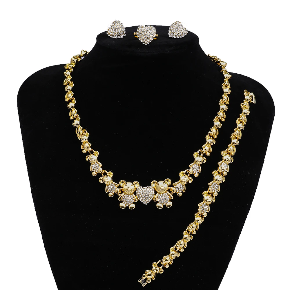 

Fashion Fashion with a diamond-studded bear necklace with a sparkling XOXO necklace