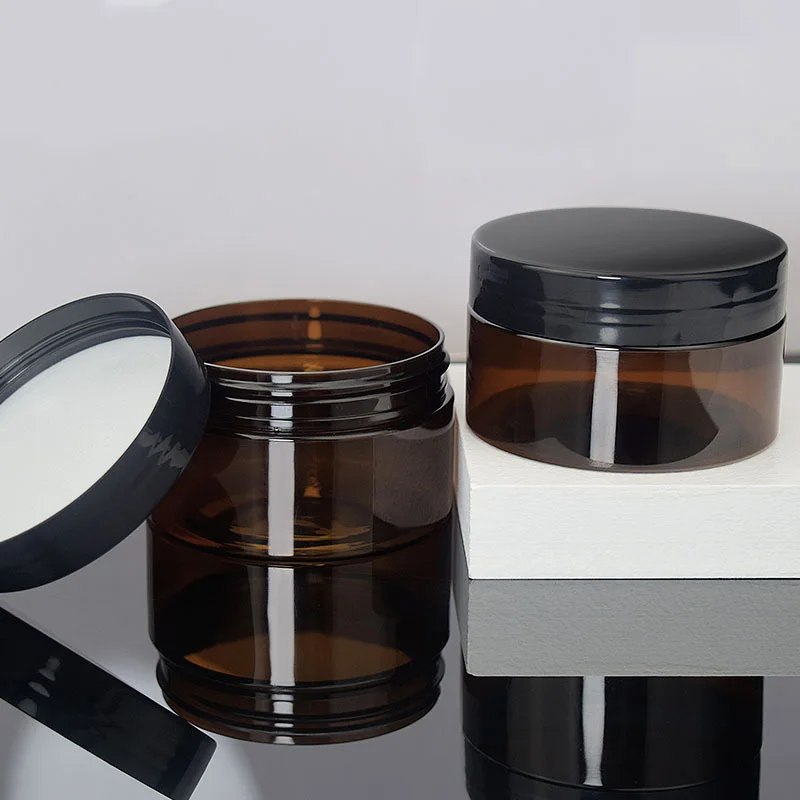 

Wholesale 100ml pet plastic amber cream cosmetic jars with black screw cap