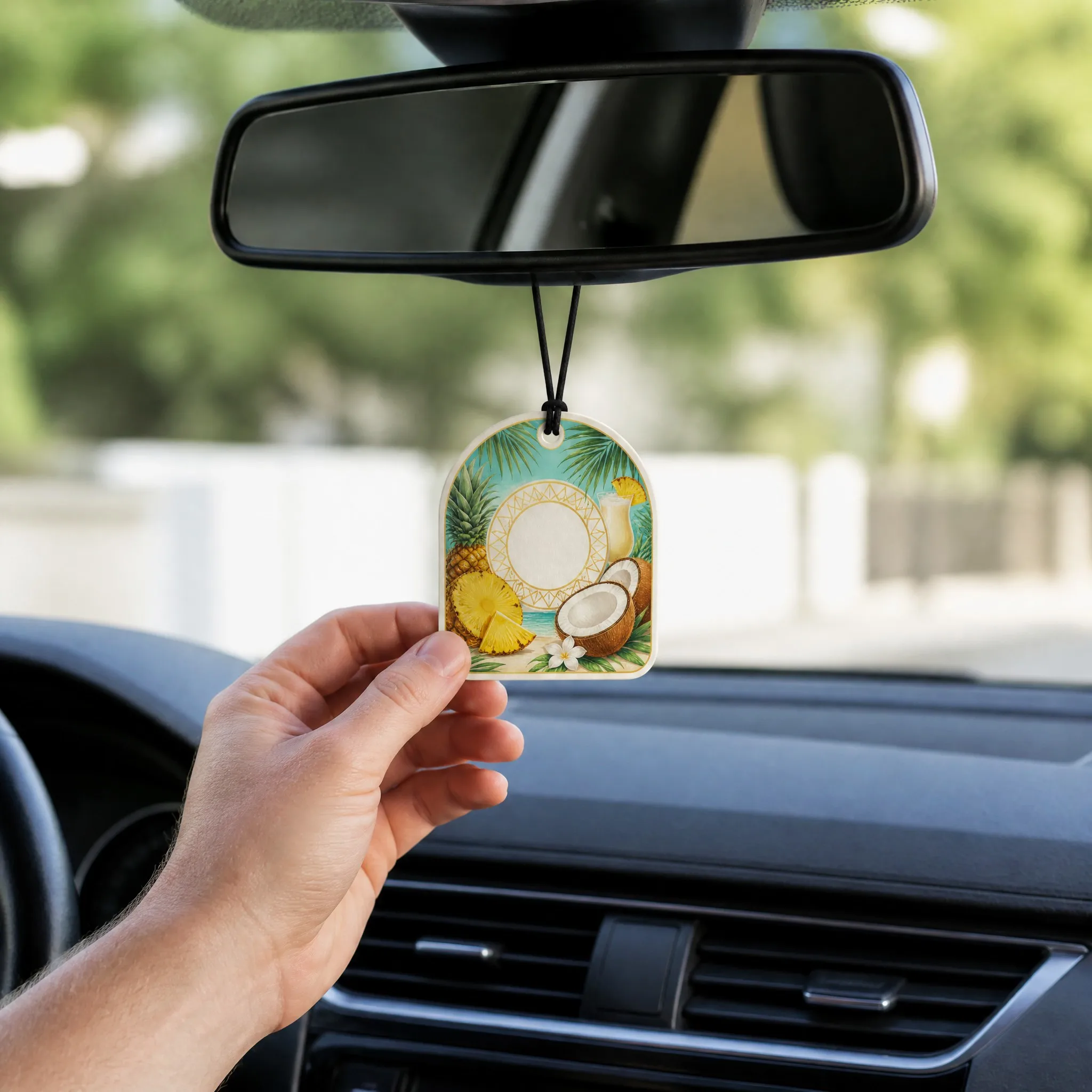 Tropical Piña Colada Scented Air Freshener Hanging in Car from Rearview Mirror Lifestyle Context