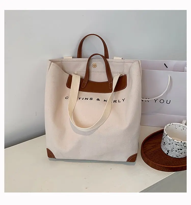 

Factory customized hot sale large capacity traveling portable single shoulder cross carry cotton shopping bag, Any color are available