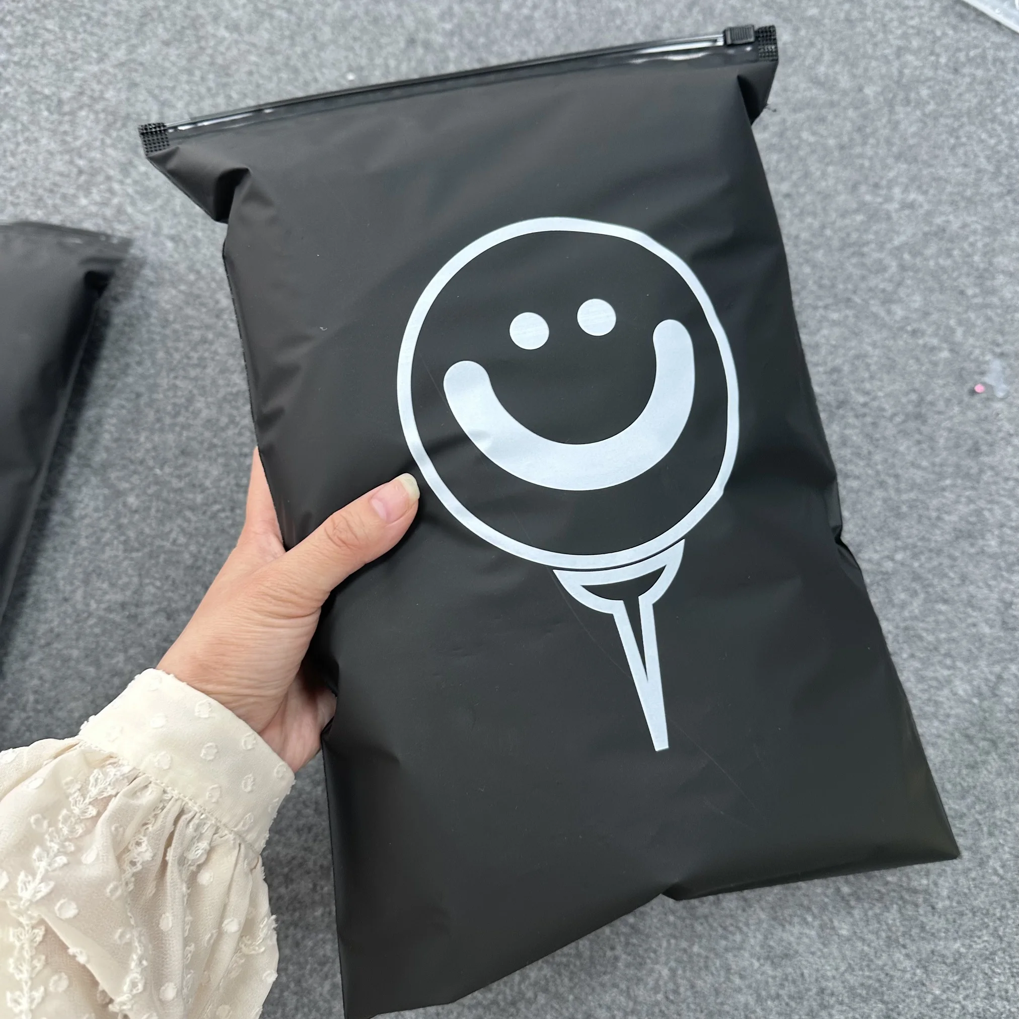 

Biodegradable Custom Transparent Slider Hoodie Zipper Matte Plastic Packaging Bags For Shirt And Swimwear