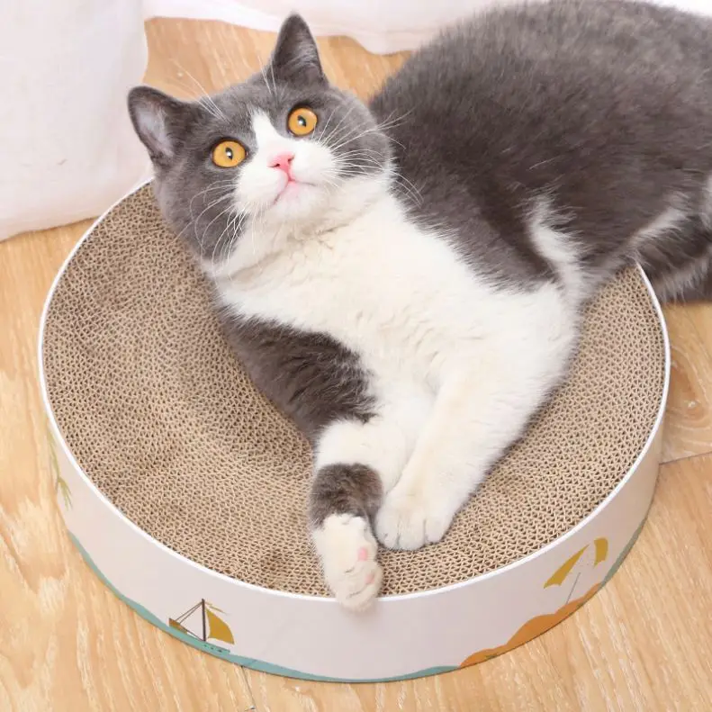 

Simple Round Scratcher Corrugated Cat Scratcher Sleeping Cat Mat, Photo