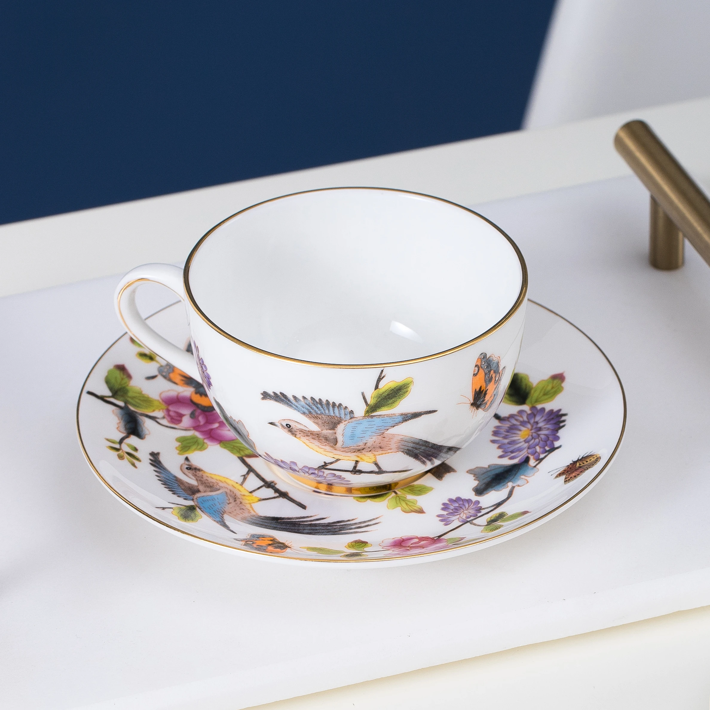 

Fancy Ceramic Teacup Vintage British Coffee Cup and Saucer Bird Floral Decal Design Bone China Coffee Cup Set