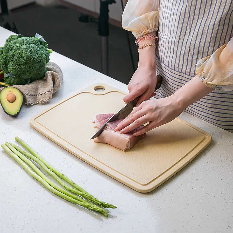 

Eco friendly and anti slip chopping board for kitchen use rice husk cutting board