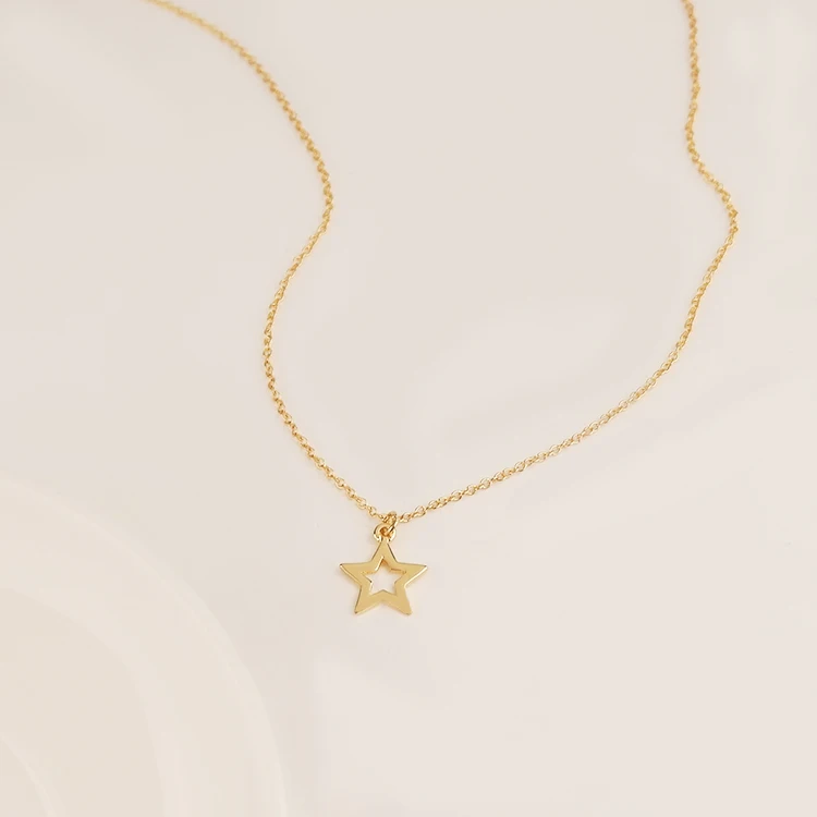 

Hot selling 18k gold plated Simple exquisite Hollow star sign necklace for woman