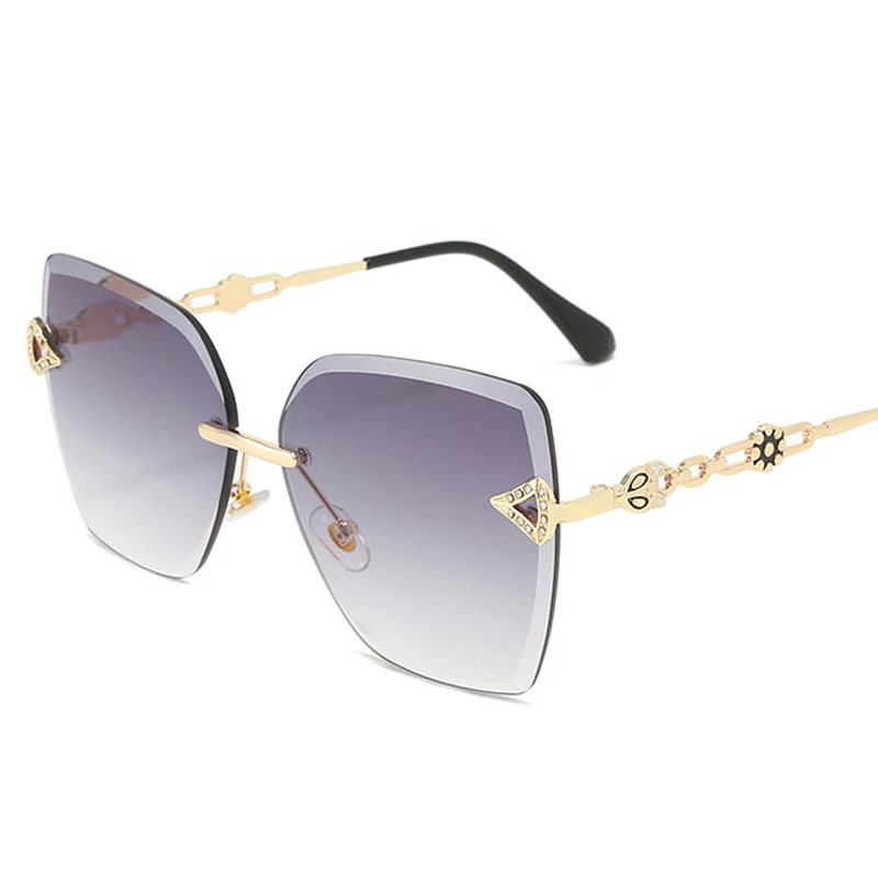 

wholesale new stylish rimless frame rhinestone sun glasses women elegant luxury sunglasses