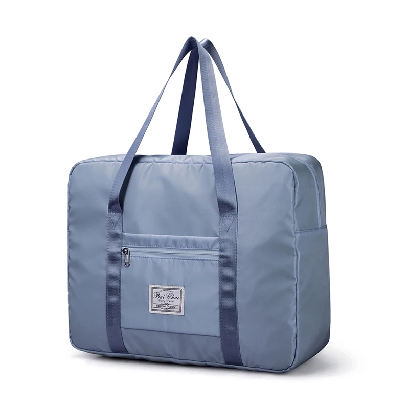 

Wholesale Creative New Nylon Waterproof Unisex Boarding Bag Folding Travel Bag Hand Luggage Storage Bag