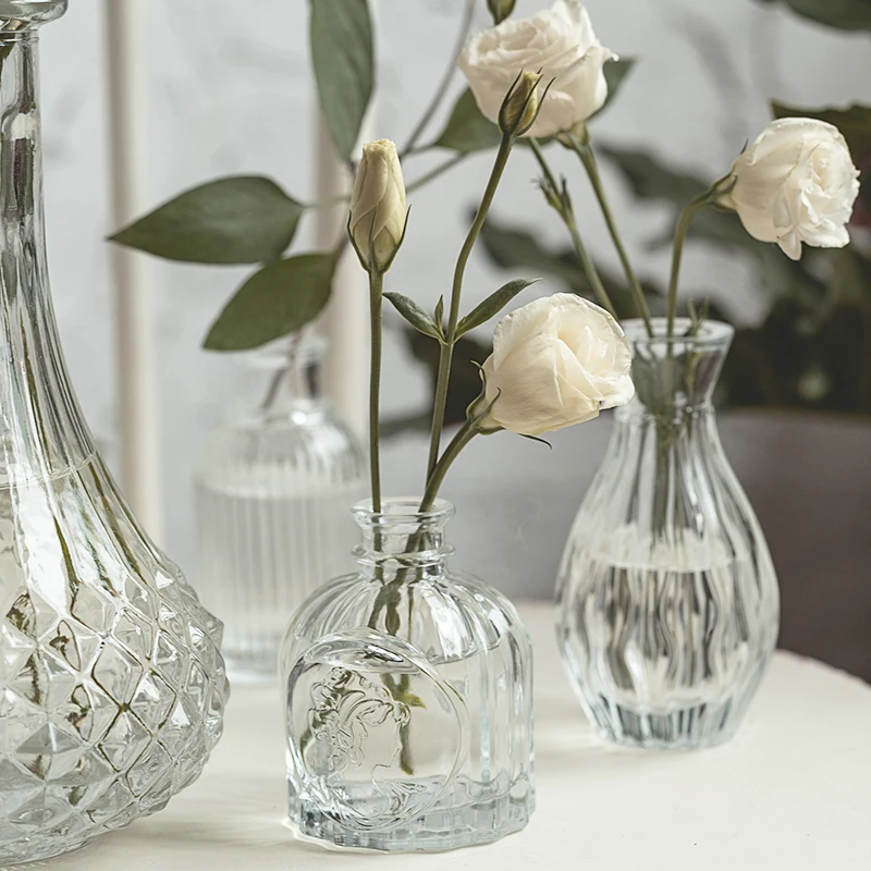 

hot sale luxury angel shaped glass clear modern bottle wedding decor vases wholesaler