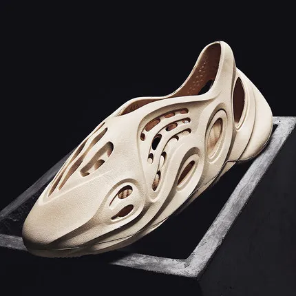 

Genuine initial state coconut hole shoes couple 2021 summer new personality dual-use sandalsYeezy Foam Runner, Black /white /beige