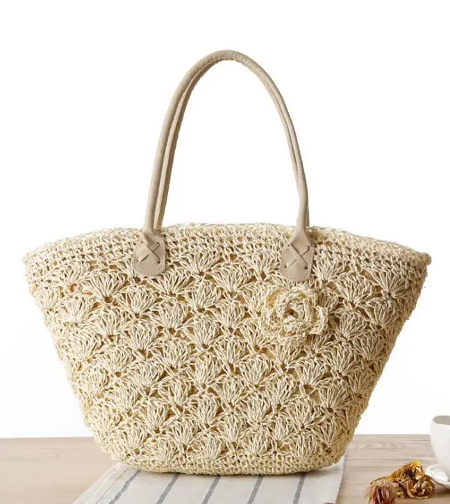 

new fashion women Wooden handle ring Korean leisure Straw beach straw hand clutch bag