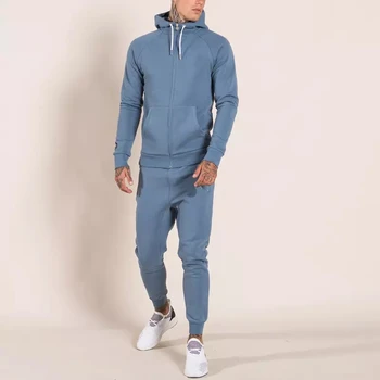 nike tech tracksuit light blue