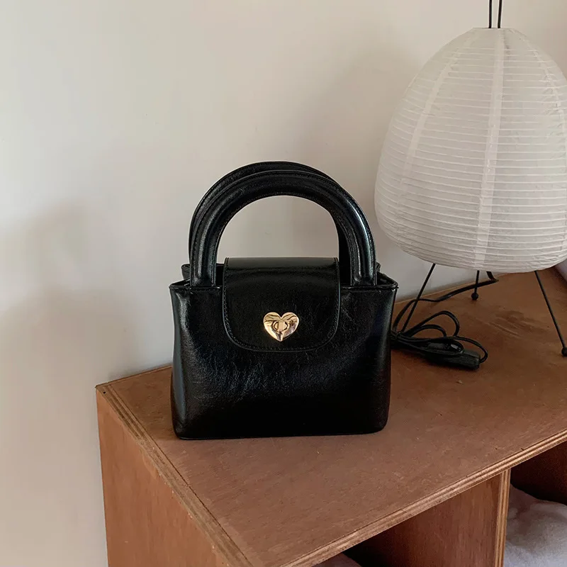 

Small group love lock buckle portable women's bag casual fashion one shoulder diagonal cross bag