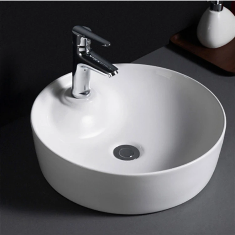 503 Single faucet hold fancy table mounted round ceramic wash basin