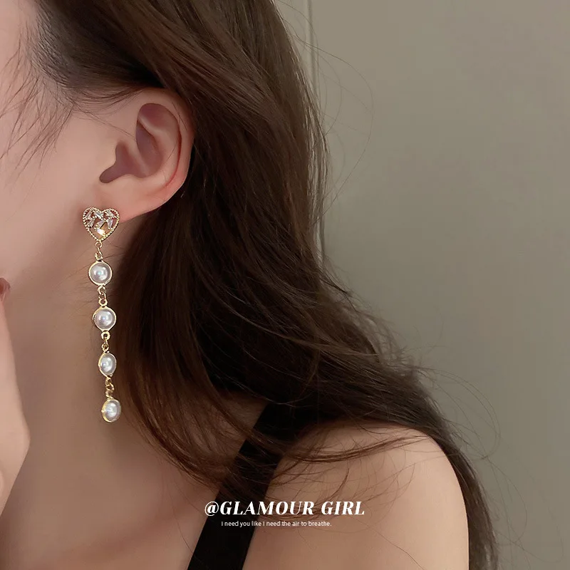 

fashion quality dangling heart earrings 18k gold plated