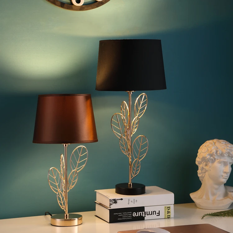 European modern design creative leaf shape iron material luxury gold table lamps for hotel home decor.jpg