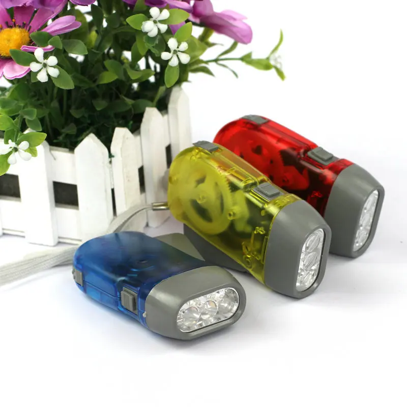 

Latest product outdoor classic hand pressing plastic energy saving outdoor plastic crank flashlight, Yellow red blue