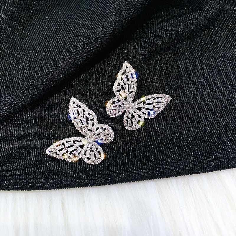 

Rhodium Plated White Copper Crystal Earrings Girl Exquisite Beautiful Weddings Jewelry Gifts Butterfly Zircon Stud Earrings