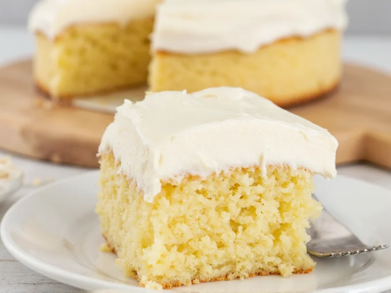 Smooth vanilla buttercream frosting on cake slice
