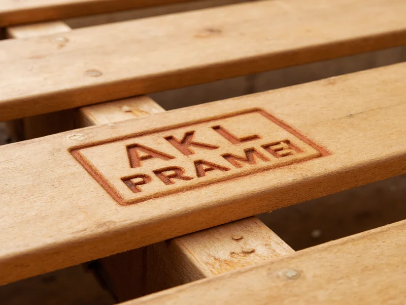 Close-up of heat-treated pallet stamp on wooden slat