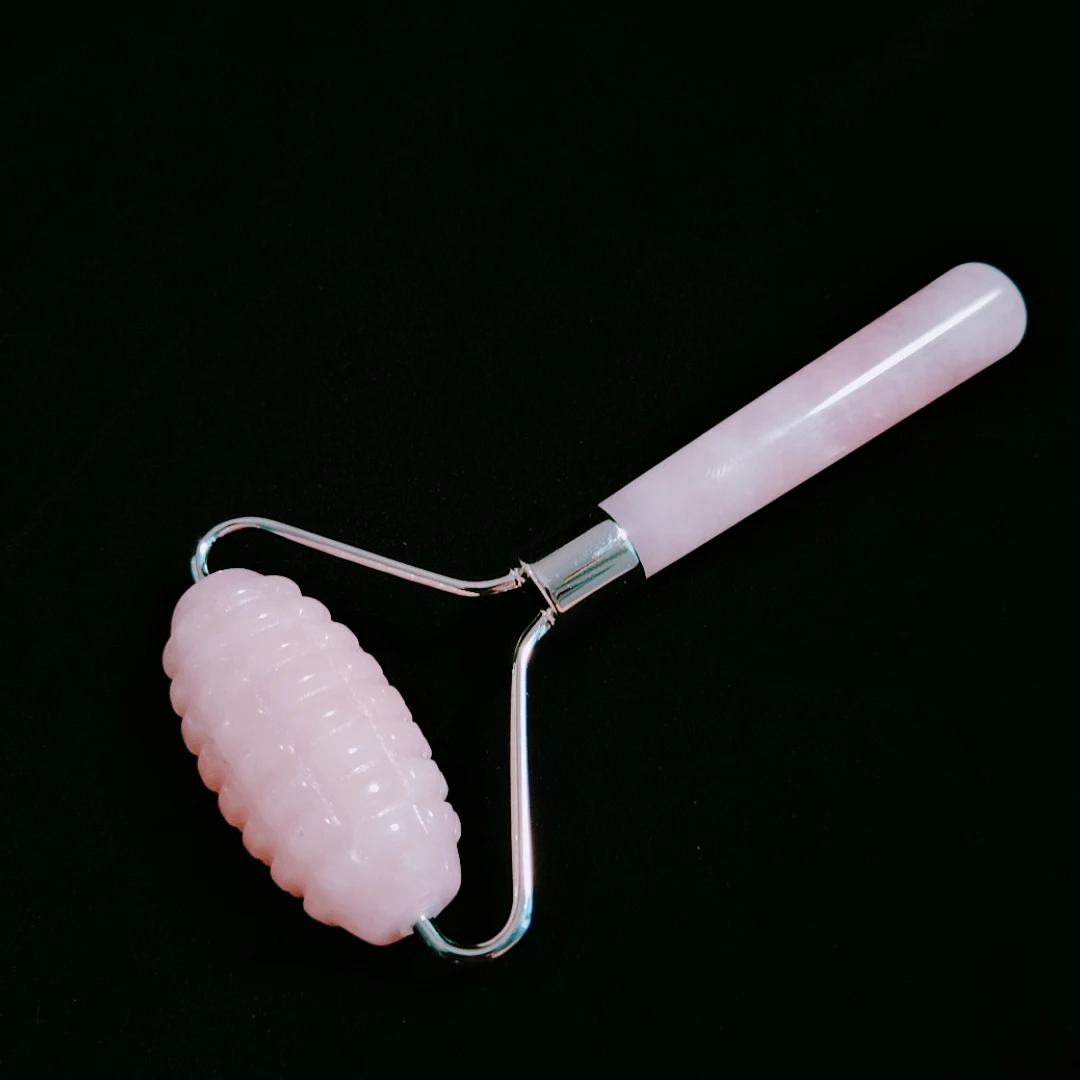 

Good Price Natural stone silver metal Rose Quartz Rollers one hand massage and rugged edge roller