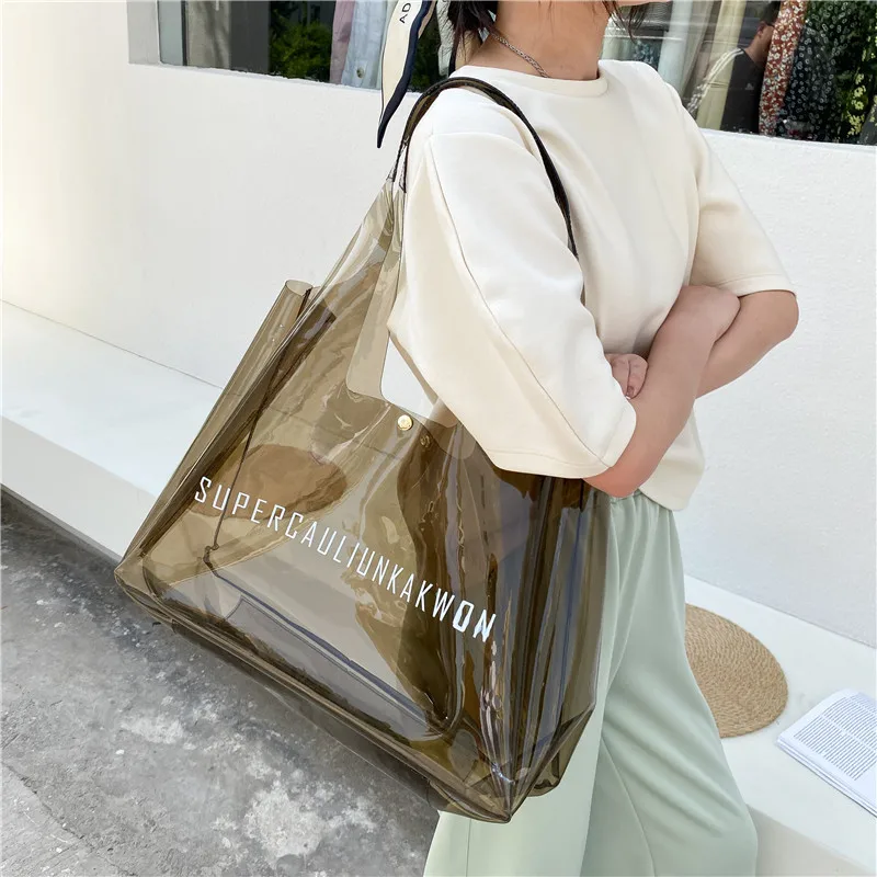 

Wholesale Custom Summer Fashion Colorful Large Capacity Clear PVC Shoulder Shopping Bag Jelly Beach Bag For Ladies