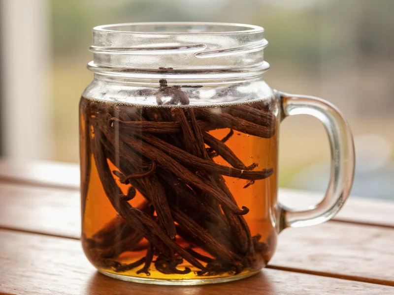 Vanilla beans steeping in mason jar